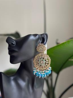 Sky blue/golden bahubali earring and maagtika.